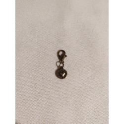 Breloque ronde avec un coeur